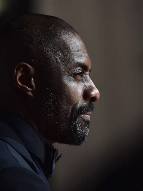 idris elba side profile.